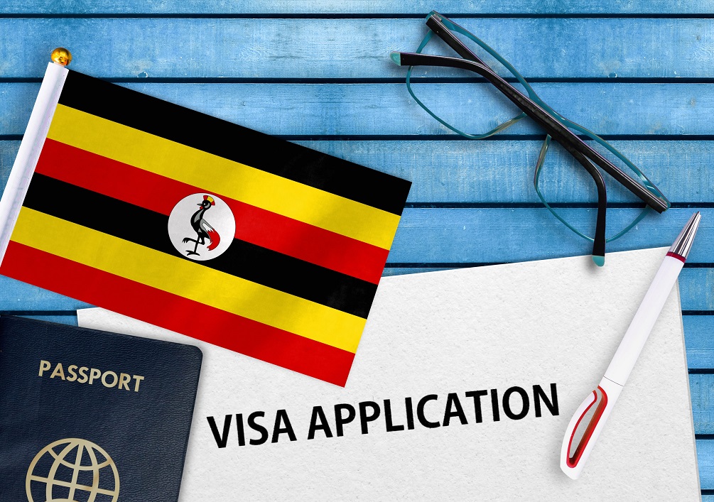 Visa application form and flag of Uganda