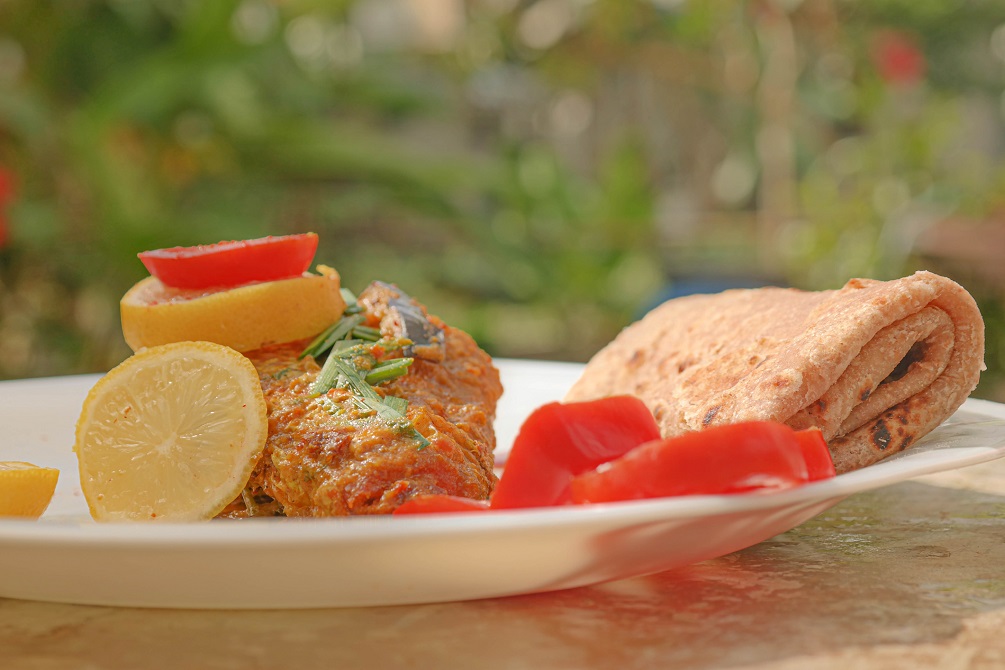 Fish curry Mauritius Indian Plate with roti and fish