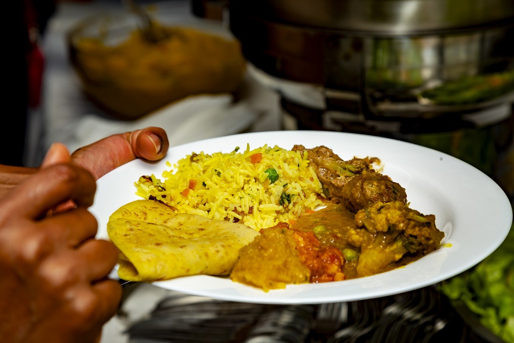 Vegetarian meal with rice and doll puri