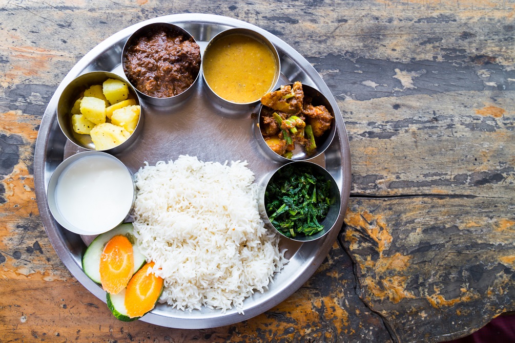 Nepali Thali meal set with mutton curry