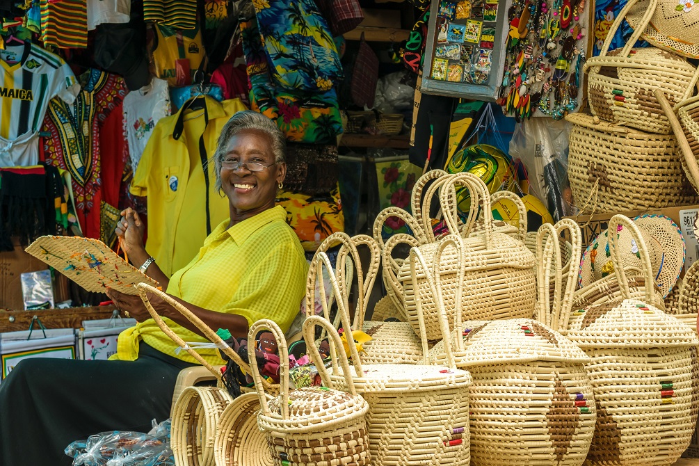 Smiling Jamaican female vendor