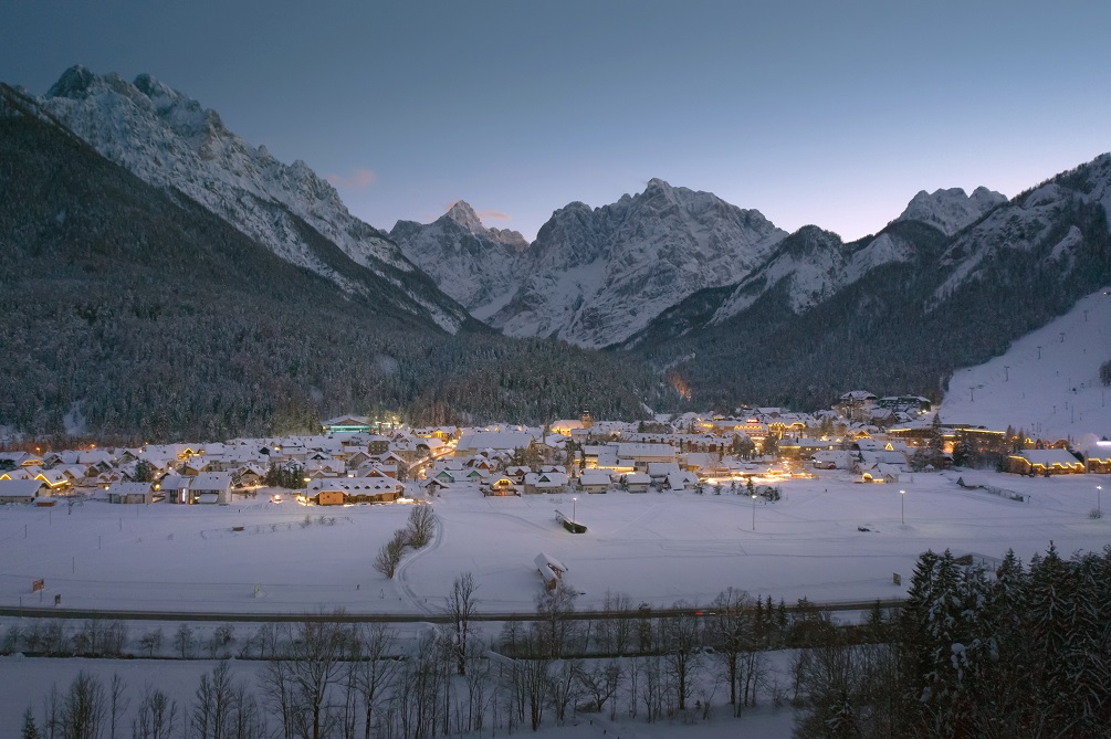 Kranjska gora at winter with lights at twilight in Slovenia