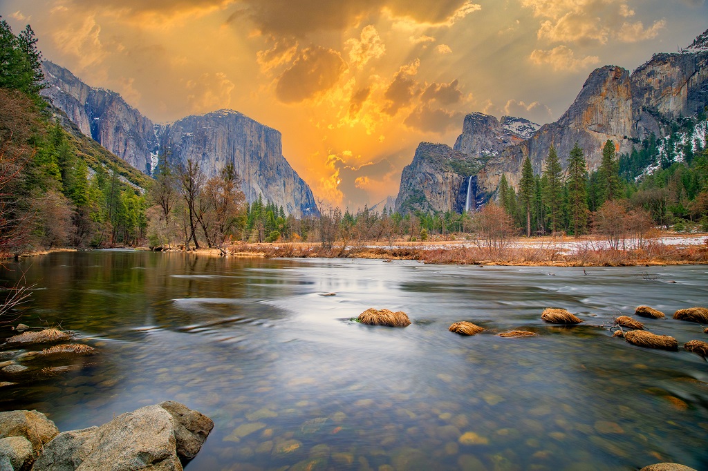 beautiful view in Yosemite valley with half dome and el capitan from Merced river